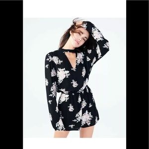 Aeropostale sz s Black floral long sleeves romper